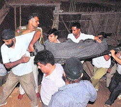 A rescued labourer being rushed to the hospital. 