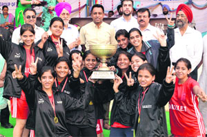 Students of DAVIET, Jalandhar, in jubilant mood after clinching the title of the PTU Inter-College Handball Tournament held in CT Institute, Jalandhar, on Sunday. 