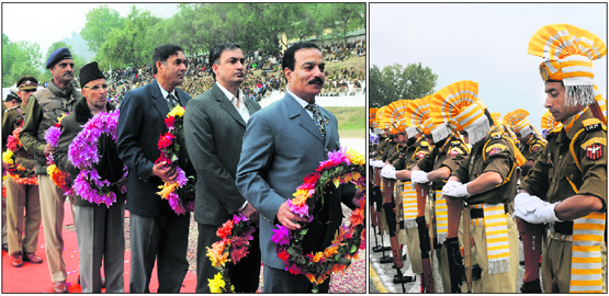 Jammu and Kashmir police officials stand in a queue to pay floral tributes during the annual Police Commemoration Day ceremony at the police headquarters; (right) policemen observe silence while paying tributes to the martyrs in Srinagar on Sunday.