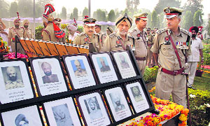 Punjab DGP paying homage to martyrs at PAP Jalandhar on Sunday. 