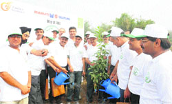 MSIL officials at the launch of companys corporate social responsibility initiative Green Aravalli at Panchgaon village, near Manesar. A Tribune photograph