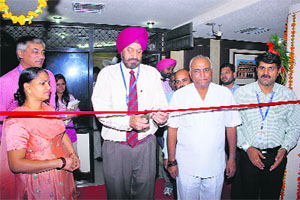 Kurukshetra University Vice Chancellor Lt-Gen DDS Sandhu inaugurates a weapon and coin section at Dharohar Haryana Museum in Kurukshetra in Monday.