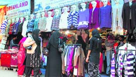 Women shop for woollens in Srinagar on Monday.