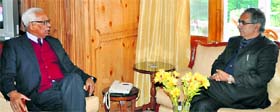 Governor NN Vohra and Agriculture Minister Ghulam Hassan Mir during a meeting at Raj Bhawan in Srinagar on Monday.