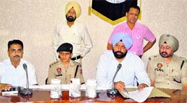ADCP, Special Branch, Harmohan Singh addresses a press conference in Ludhiana on Monday.