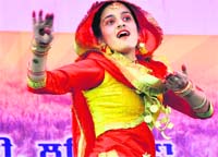 A girl performs during the PAU Golden Jubilee Inter-College Youth Festival in Ludhiana on Monday.
