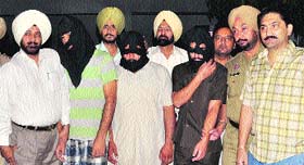 The accused in police custody.