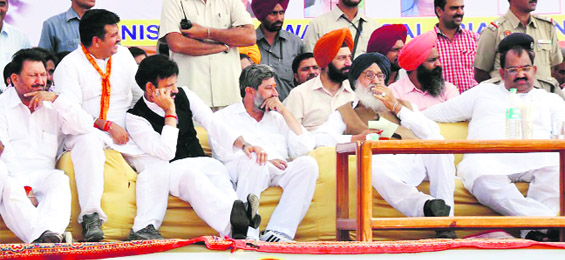 Chief Minister Parkash Singh Badal, BJP state president Ashwani Sharma and other leaders at a rally in Pathankot. 