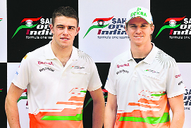 Sahara Force India drivers Paul Di Resta and Nico Hulkenberg pose after a press conference in New Delhi on Monday.