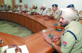 SSP Ravcharan Singh Brar (right) presides over a police-public meeting organised at the District Administrative Complex in Bathinda on Tuesday. 