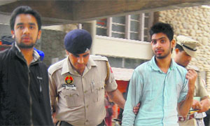 The accused in police custody.