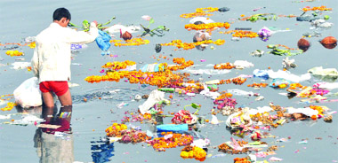The Yamuna littered with waste after the Navratri festival in New Delhi on Tuesday.