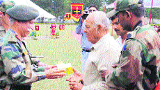 Northern Command GOC-in-C Lt Gen KT Parnaik interacts with an ex-serviceman at a rally in Udhamapur on Tuesday. 