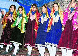 College girls perform a dance at a function organised by the Kashmir Private College Association in Pulwama on Tuesday
