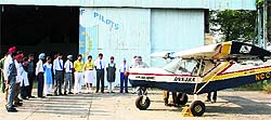 Schoolchildren with NCC Air Wing officials at the Sahnewal airport in Ludhiana on Tuesday