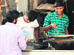 Eatables being deep fried at a shop in Amritsar, A Tribune photograph