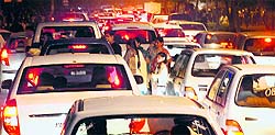 Vehicles stuck in a traffic jam on road separating Sectors 4 and 5 in Panchkula on Wednesday