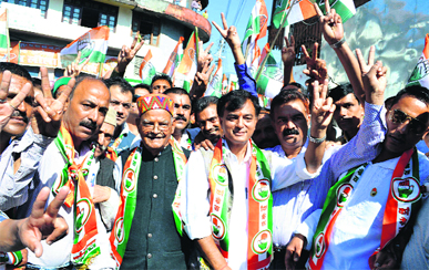 Anil Sharma canvasses with his father Sukh Ram.