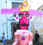 Residents of Green Avenue and Mohalla Dada Nagar invite a person who has never committed a sin and indulged in corruption to burn the effigy of Ravana in Jalandhar. Tribune Photo: Malkiat Singh