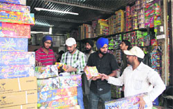 People buy crackers at Burlton Park on Dasehra in Jalandhar on Wednesday. Photo: Sarbajit Singh