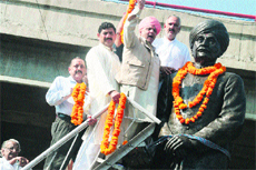 BJP leaders pay tributes to late Prem Nath Dogra on his birth anniversary at Dogra Chowk in Jammu on Wednesday.