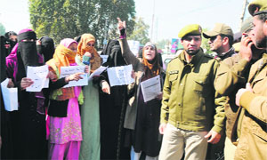 Women separatist activists, who were trying to submit a memorandum, at UN Observers office in Srinagar on Wednesday. 
