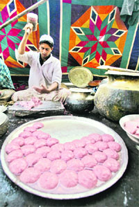 A cook prepares Gushtaba during a marriage ceremony in Srinagar.