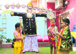 Students of ABC Montessori enact a ramlila scene in Ludhiana on Wednesday. 