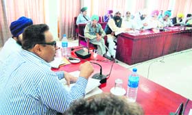 Sarvesh Kaushal, Principal Secretary, Freedom Fighters Department, Punjab, addresses freedom fighters and their families at Bachat Bhavan in Amritsar on Thursday.