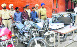 The accused in police custody in Chandigarh on Thursday. Tribune photo Manoj Mahajan
