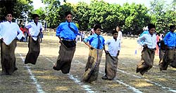 Underprivileged schoolchildren participate in a sack race organised by St Joseph's Academy in Dehradun on Thursday
