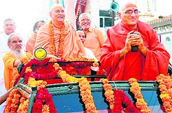 Swami Satyamitranand and Swami Avdeshanand lead a procession prior to the Ganpati mahayajna in Haridwar on Thursday