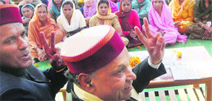 Chief Minister PK Dhumal at a rally in support of BJP candidate Inder Singh in Sarkaghat.