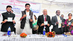 Minister of State for Communications and IT Sachin Pilot releases the CD of e-learning content for the Course on Computer Concepts in Dogri language in the University of Jammu on Thursday.