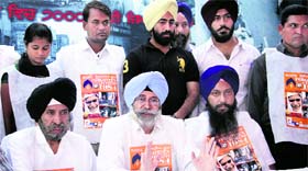 Senior Supreme Court advocate Harvinder Singh Phoolka addresses a press conference in Jalandhar on Thursday.