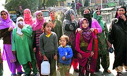 Residents of old city and Rambagh areas of Srinagar stage a protest on Thursday