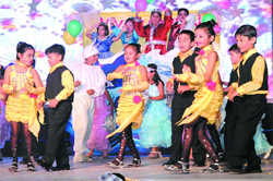 Children of the kindergarten section of St. Xavier's Senior Secondary School perform a colourful dance at the annual day celebrations on Friday evening. Tribune photo: pawan Sharma