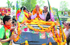 Ravinder Singh Ravi during an election campaign in Dehra.