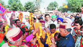 Chief Minister PK Dhumal being welcomed at Paonta Sahib on Friday.