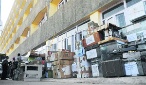 Workers load official documents in trucks in Srinagar as part of the bi-annual Darbar move.