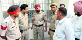 Police personnel outside the court complex following the escape of a prisoner in Jalandhar on Friday.