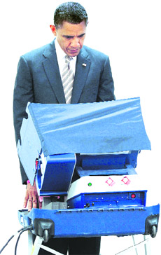 Barack Obama casts his vote at the Martin Luther King Community Center in Chicago. 