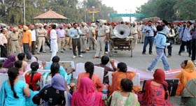 Squat on the road near Sirhind Canal to stage protest against the alleged indifference of the government.