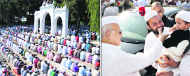 Muslims offer prayers at an idgah on the occasion of Id-ul-Zuha in Dehradun on Saturday; and (right) Governor Aziz Qureshi wishes a child outside the EC road mosque.