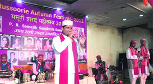Preetam Bhartwan and his team give a performance during the autumn fair celebrations in Mussoorie.