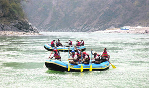 Rafters negotiate Ganga waters at Kaudiyala. The Uttarakhand government has recently waived the entertainment tax on rafting.