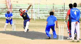 Players in action during the Eid-Diwali Milan Cup Cricket Cup Tournament at MA Stadium on Saturday.