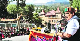 Nitin Gadkari, BJP president, addresses supporters during an election rally at Reckong Peo in Kinnaur.