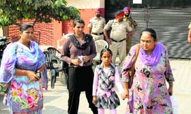 Members of the Istri Jagran manch, who were not allowed to meet Shruti, outside the Nari Niketan in Jalandhar.