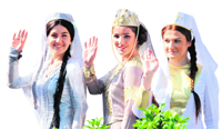 Georgian women wear traditional costumes during the annual Tbilisoba City Day celebration in Tbilisi.
